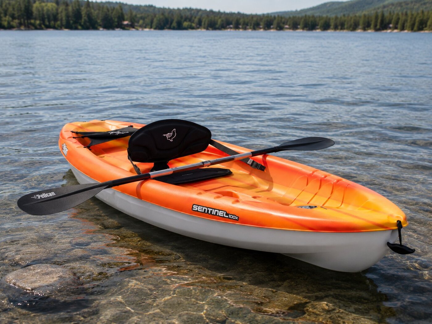 Maeve — Pelican Sentinel 100X sit-on-top kayak at the water's edge